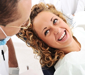Smiling woman in dental chair