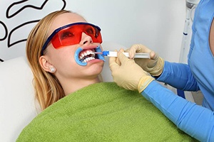 Patient receiving teeth whitening treatment