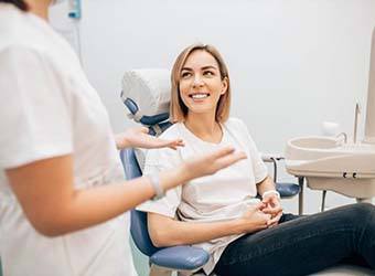 woman talking to her dentist