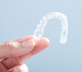 Close-up of clear-plastic aligner