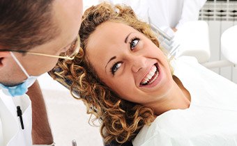 Smiling woman in dental chair