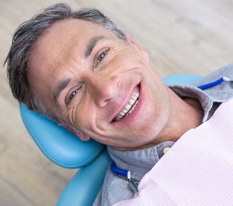 Dental patient in chair waiting for scaling and root planing in Merrimack, NI