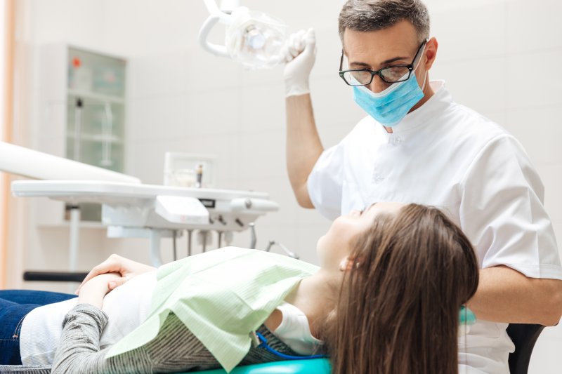 a dentist and a female patient
