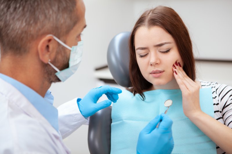 Dentist treating a dental emergency