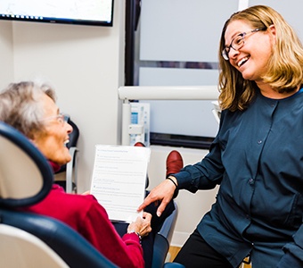 Dr. McVety discussing cosmetic bonding options with a patient at Casco Bay Smiles